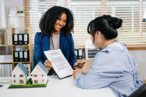 Real estate agent explaining a contract to a client during a professional consultation